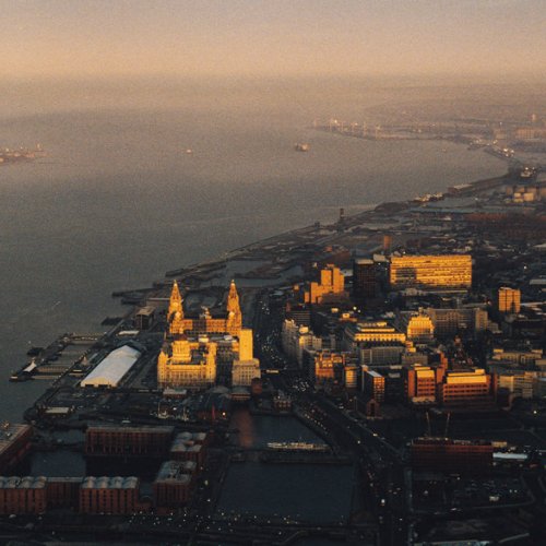 LIV113 Liverpool UNESCO World Heritage Site First light - Liverpool in the last days of 1999 getting ready to herald in the new age Guy Woodland 1989-2011